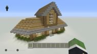 A multi-form roof for a wood and stone mansion (Image via Gabe Ambrosio)